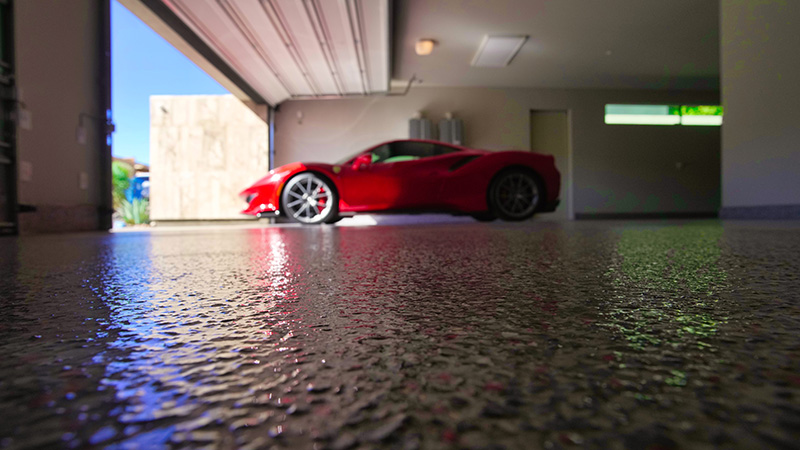 garage floor coating with red car