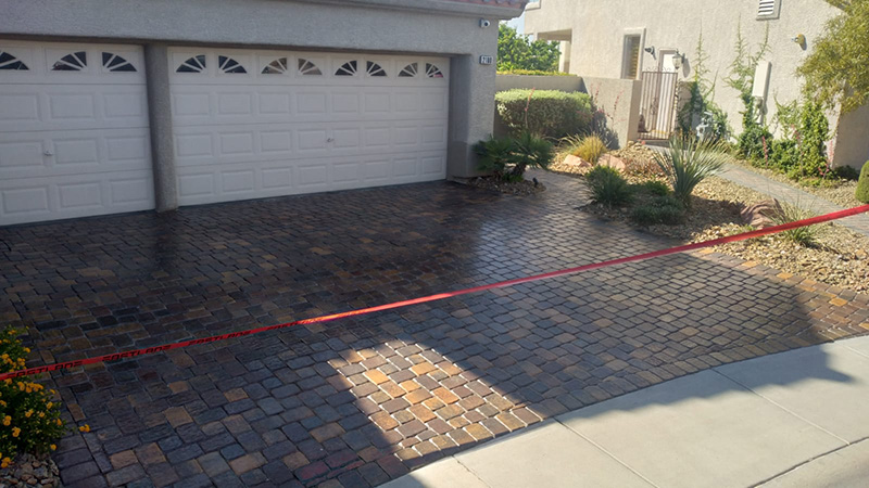 brown home with pavers after clean and seal