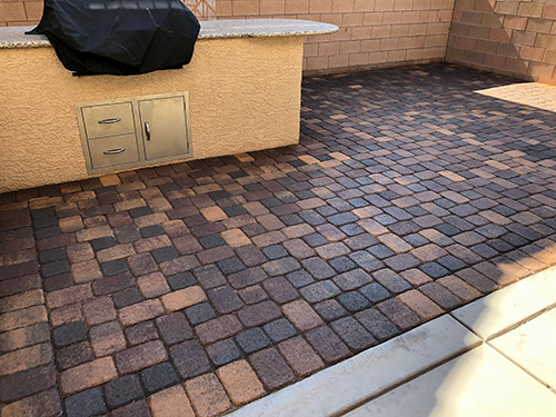 Finished residential paver sealing at a Las Vegas home with enhanced color and uniform finish