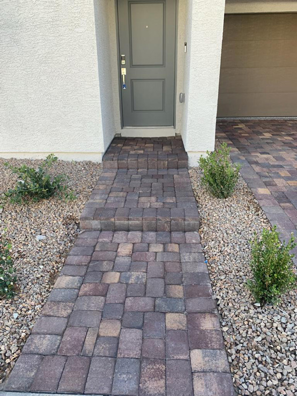 unclean pavers and door of home